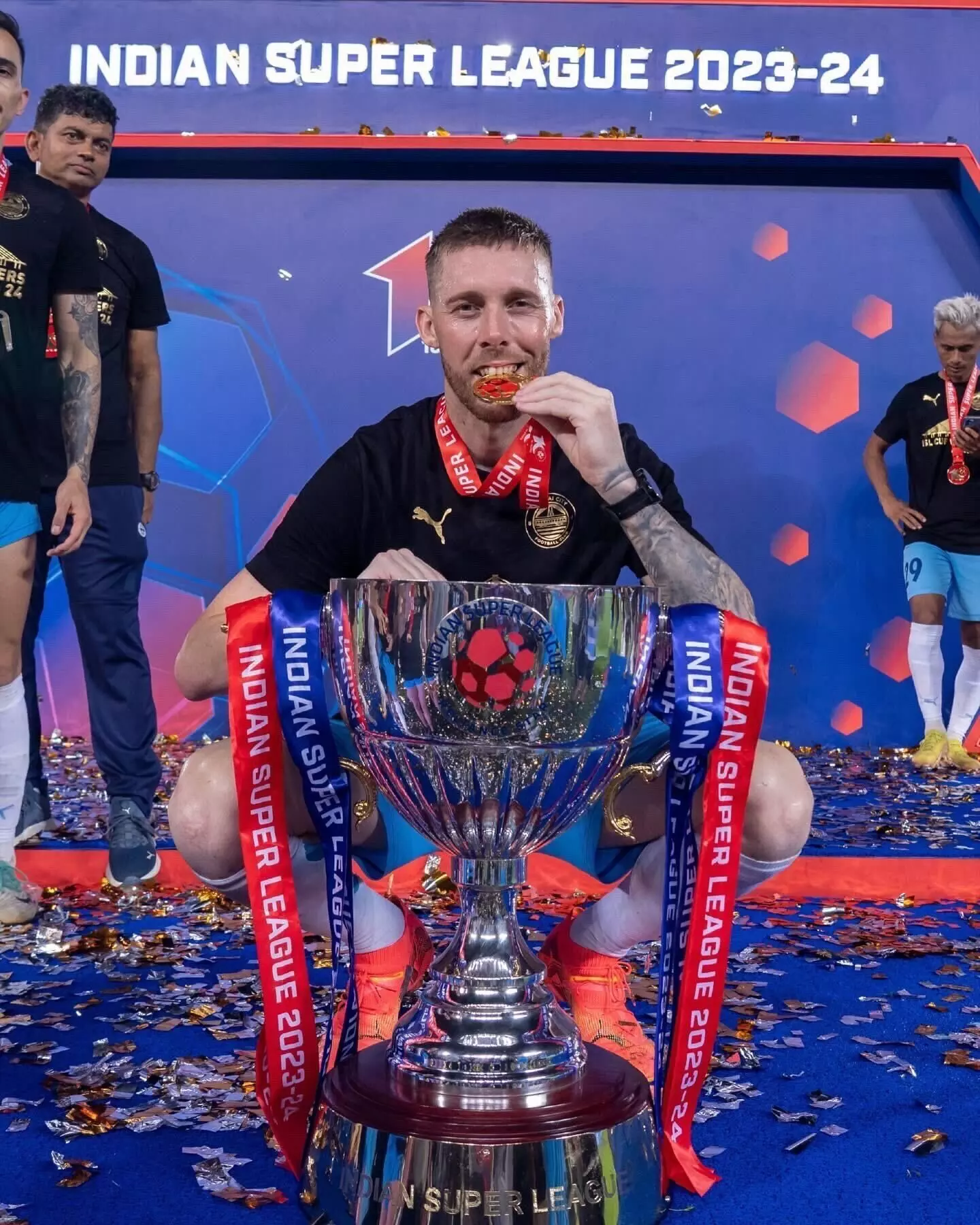 Tiri with ISL trophy (Photo credit: Tiri)